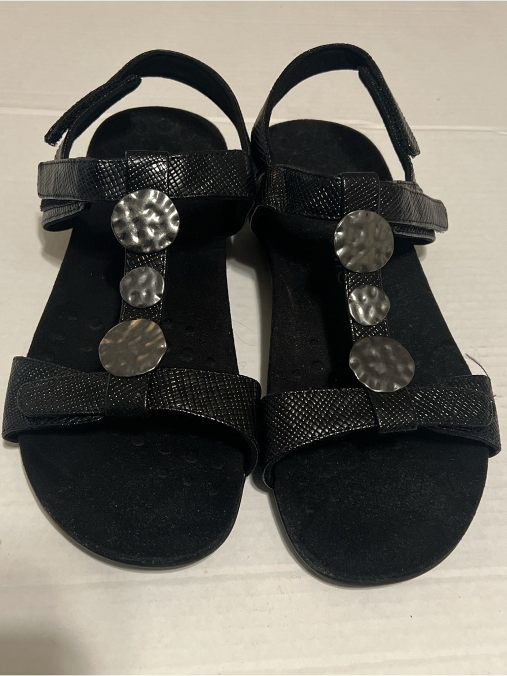 Vionic Farra Black Women's T-Strap Sandals with Hammered Metal Discs
